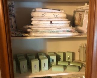 New-in-the-package tablecloths in time for the holidays. Clinique new-in-box soap and soap dishes