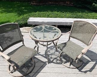 Bistro patio table and two swivel chairs