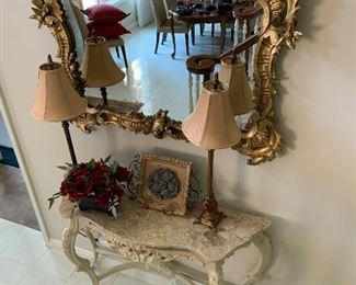 Entryway table and mirror. 
This professionally staged home is full of great  accent pieces. Everything in  this home is for sale. 