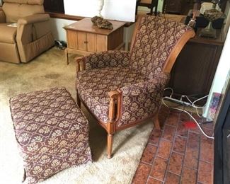 Upholstered Chair with Wood Trim and Matching Ottoman. Ottoman has casters. In Good Condition.
Lot Number: 10