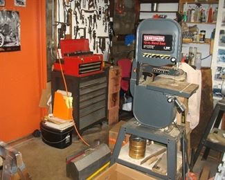 12" Craftsman band saw, grinders, tool cabinet, and SOOOOO many tools, sanders, and behind the grey saw is a "parts washer".  That's for sale too.  I'll try to remember to get a better picture of that.  There is so much to compete.