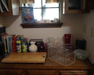 cookbooks, carving tray, vases,