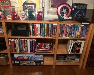 Skandia wood shelving, Disney movies, books, toys, games