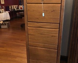 Oak file cabinet with locking drawer