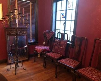 Antique dining chairs, wrought iron candelabra,  antique mirror