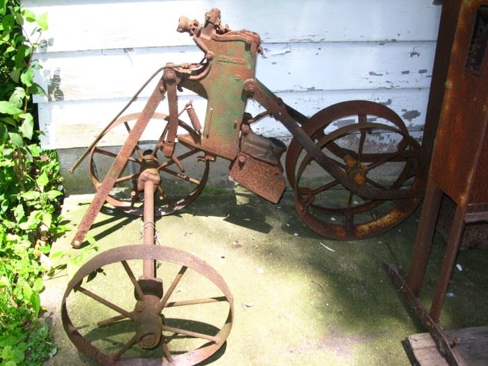 old farm equipment great for yard decorations, steam punk, industrial art