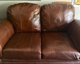 Good condition leather love seat