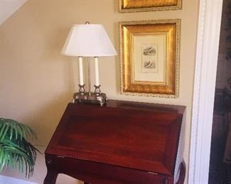 Drop front lady's writing desk--notice the prints and lamp