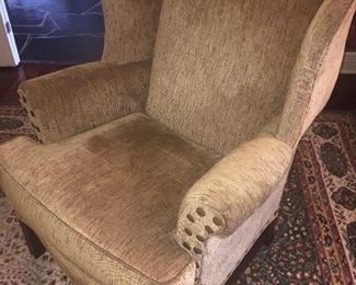 pair of upholstered wing back chairs