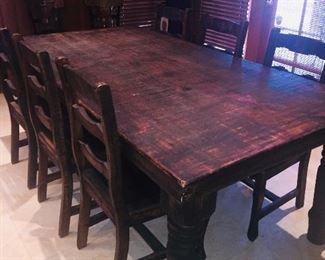 rustic table and six chairs