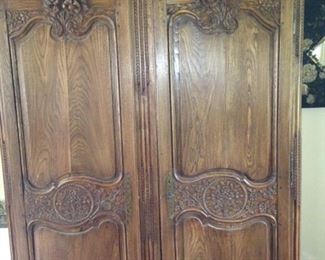 Stunning armoire with elaborate carving . . .