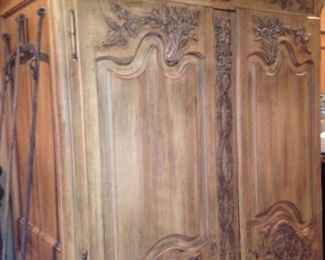 Another armoire provides more than ample storage for blankets and other linens (or whatever).