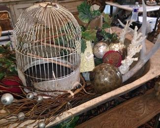 One of several rustic bird cages
