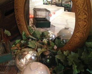 Round gold framed mirror