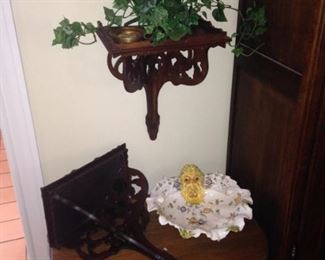 Small table; wall shelves