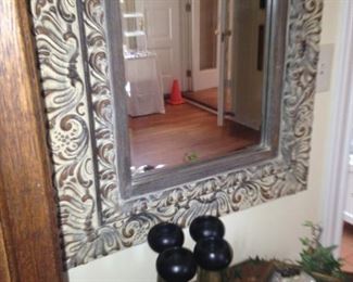 A small framed mirror