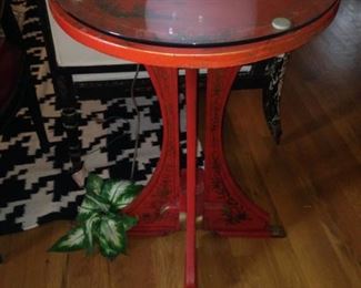 Chinese red accent table with Asian motif