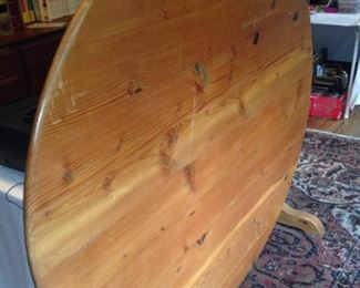 Round pine tilt top table