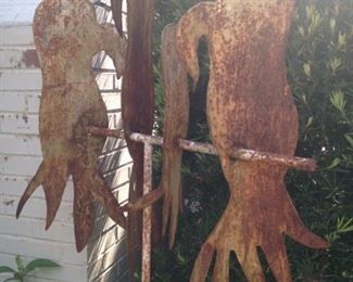 Rusty parrot yard art