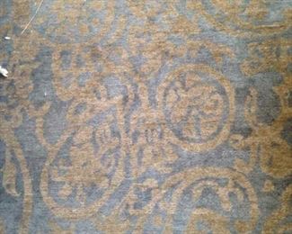 Blue/gold rug: 5 feet 7 inches x 8 feet 6 inches