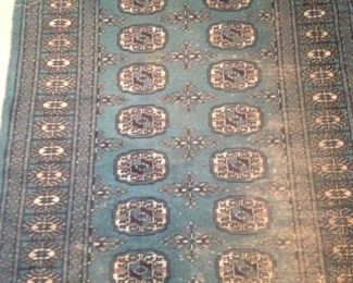 Blue rug: 5 feet 4 inches x 6 feet 1 inch