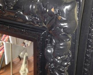 Dark framed & beveled mirror boasting great details