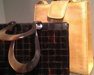 Two of the many purses