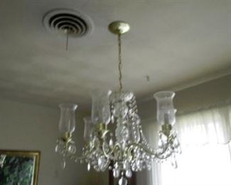 Chandelier.  Excellent condition.  Prisms all there.  Have not observed any breaks or cracks.