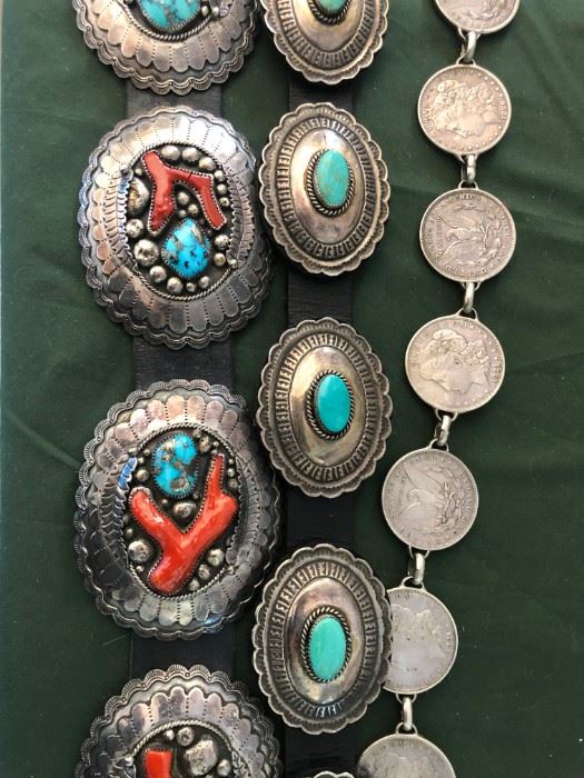 Amazing collection of Concho Belts with branch coral, turquoise, and Morgan dollars.