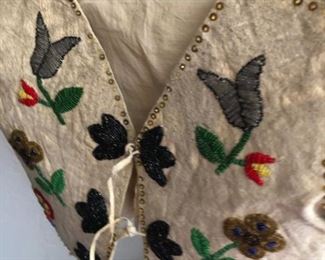 Wonderful buckskin beaded child's vest.