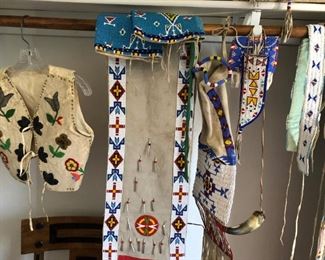 Vests, pouches, gauntlets, knife sheaths, powder horns, purses, belts, and more. This is an amazing collection.
