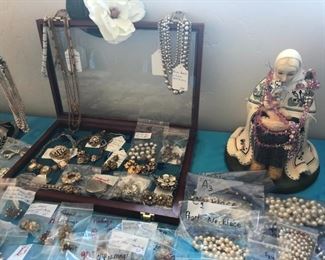 Come see our wonderful collection of vintage Miriam Haskell pieces and our Lenci Madonna.