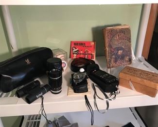 VP souvenir dop kit, more photography equipment, old Robinson Caruso book, baseballs