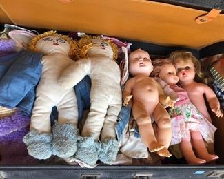 Vintage dolls and case of clothing