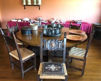 Large round oak table from the Cleveland Public Library now used as the dining table.