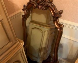 #4 gold mirror with carve design on the top 22x48 $100.00