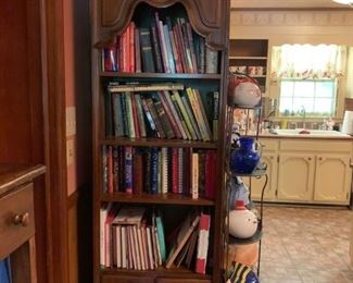 #10 book case w 2 doors w 4 shelves 24x13x78 $75.00