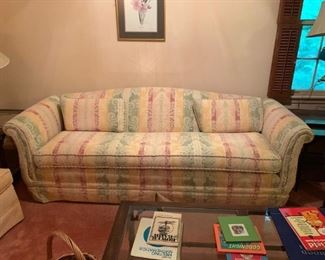 #53 cream green peach camel back sofa 87 long $75.00