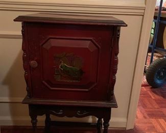 #29 wood cabinet w doors w lady painted on front 16x13x31 $125.00