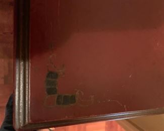 #29 wood cabinet w doors w lady painted on front 16x13x31 $125.00 This is the detail on top of the cabinet.