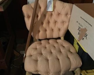 #64 chair (2) cream color odd chairs 2@25 ea. $50.00