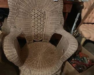 #62 wicker wicker chair w cushion 2@ $30 ea. $60.00