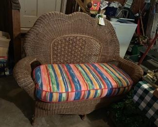 #61 wicker wicker loveseat w cushion $45.00