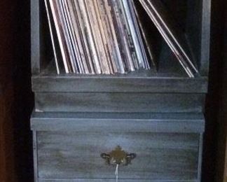 Bedside tables (shown stacked) and records
