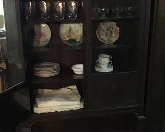 Antique china cabinet - bottom shelf is not visible when doors are closed