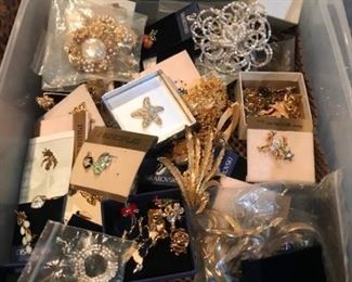 many many small pins---some Swarovski--many never worn