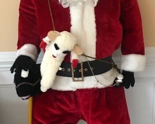 Santa Claus!  Approx. 5'10'' tall.  Hand-painted porcelain face with mohair eyebrows.  Restoration Hardware santa suit.