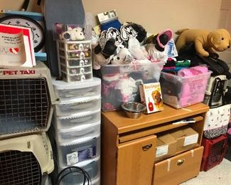 Like LOOK at this basement stuff! Anything you would want for your dog! there is even a dog grooming table in there somewhere!