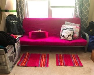 hot pink futon! Perfect to give your daughter who is off to college and you want to repel her possible beaus.