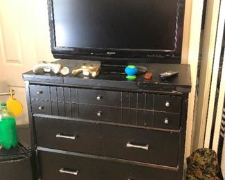 highboy dresser and large flat screen TV